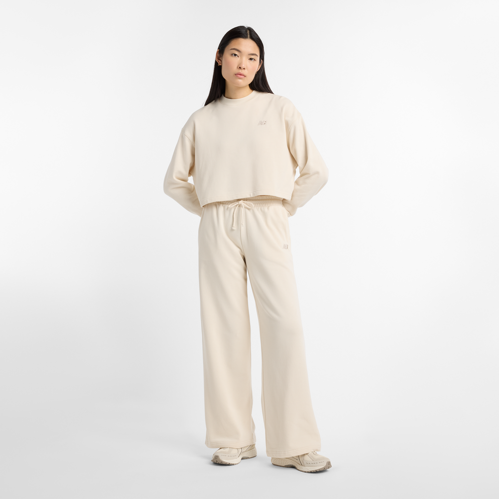 Spodnie damskie New Balance WP51503LIN – beżowe