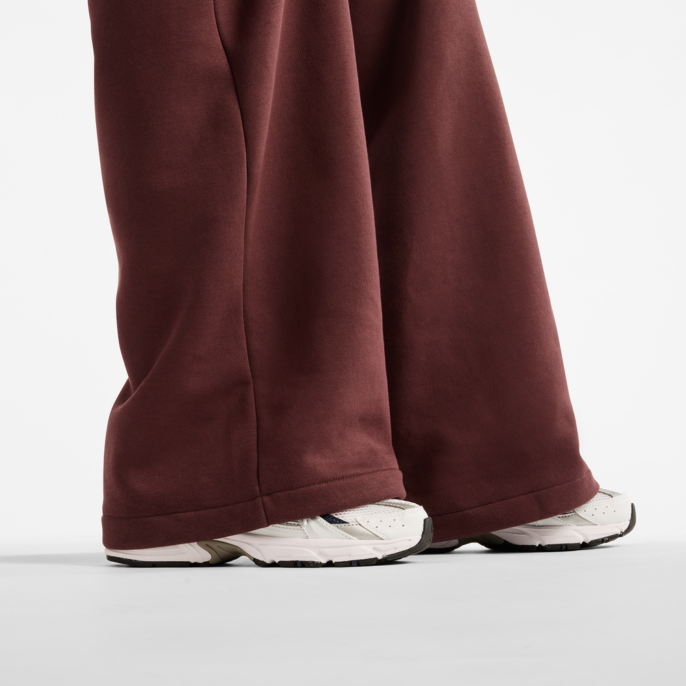 Spodnie damskie New Balance Trackside – bordowe