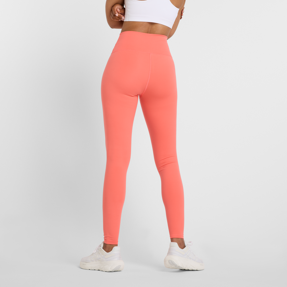 Legginsy damskie New Balance WP51126DTR – pomarańczowe