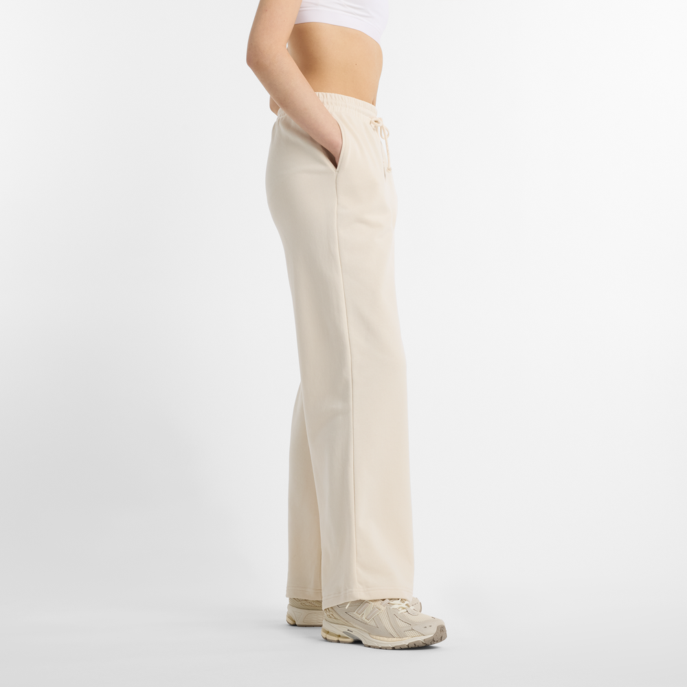 Spodnie damskie New Balance WP51503LIN – beżowe