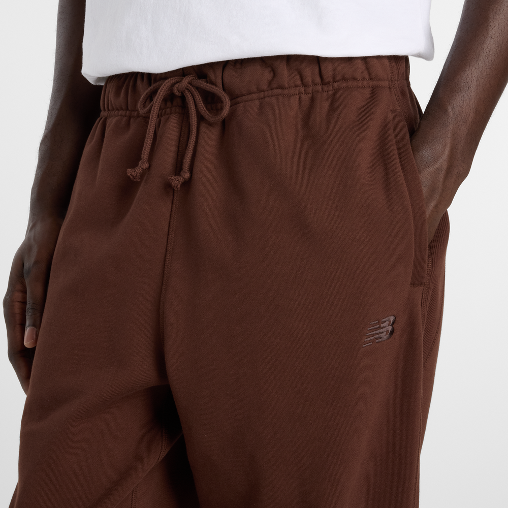 Spodnie męskie New Balance MP41508ABJ – brązowe