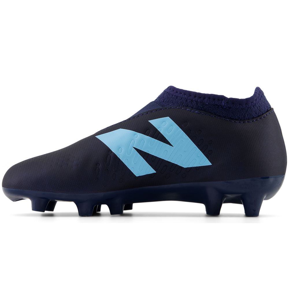 Korki dziecięce New Balance TEKELA V4+ MAGIQUEJNR FG SJT3FN45 – granatowe