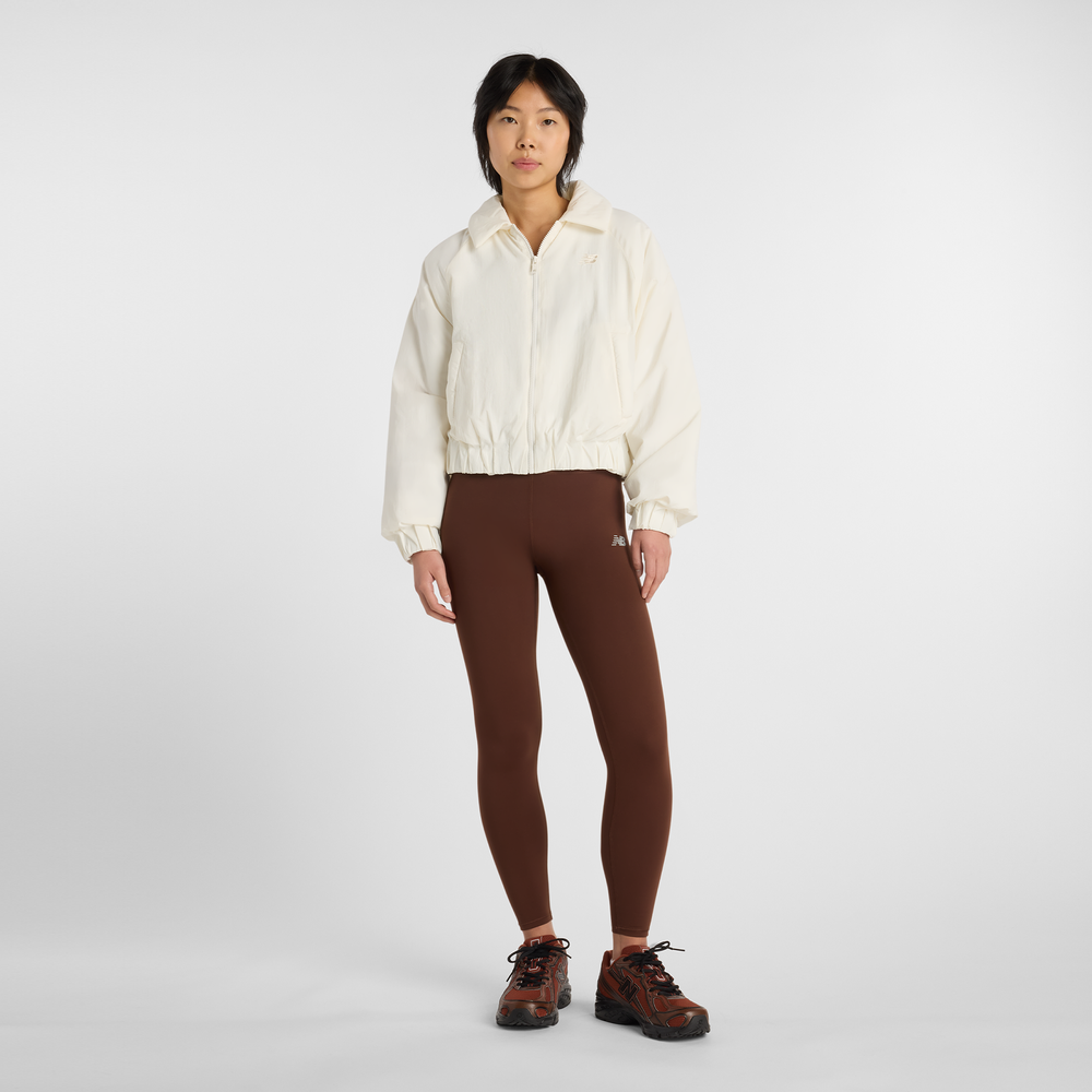 Kurtka damska New Balance WJ61D8YXSST​ – beżowa