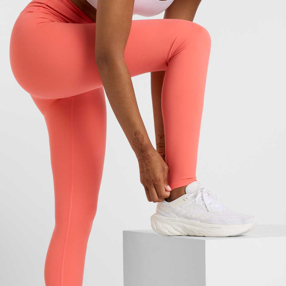 Legginsy damskie New Balance WP51126DTR – pomarańczowe