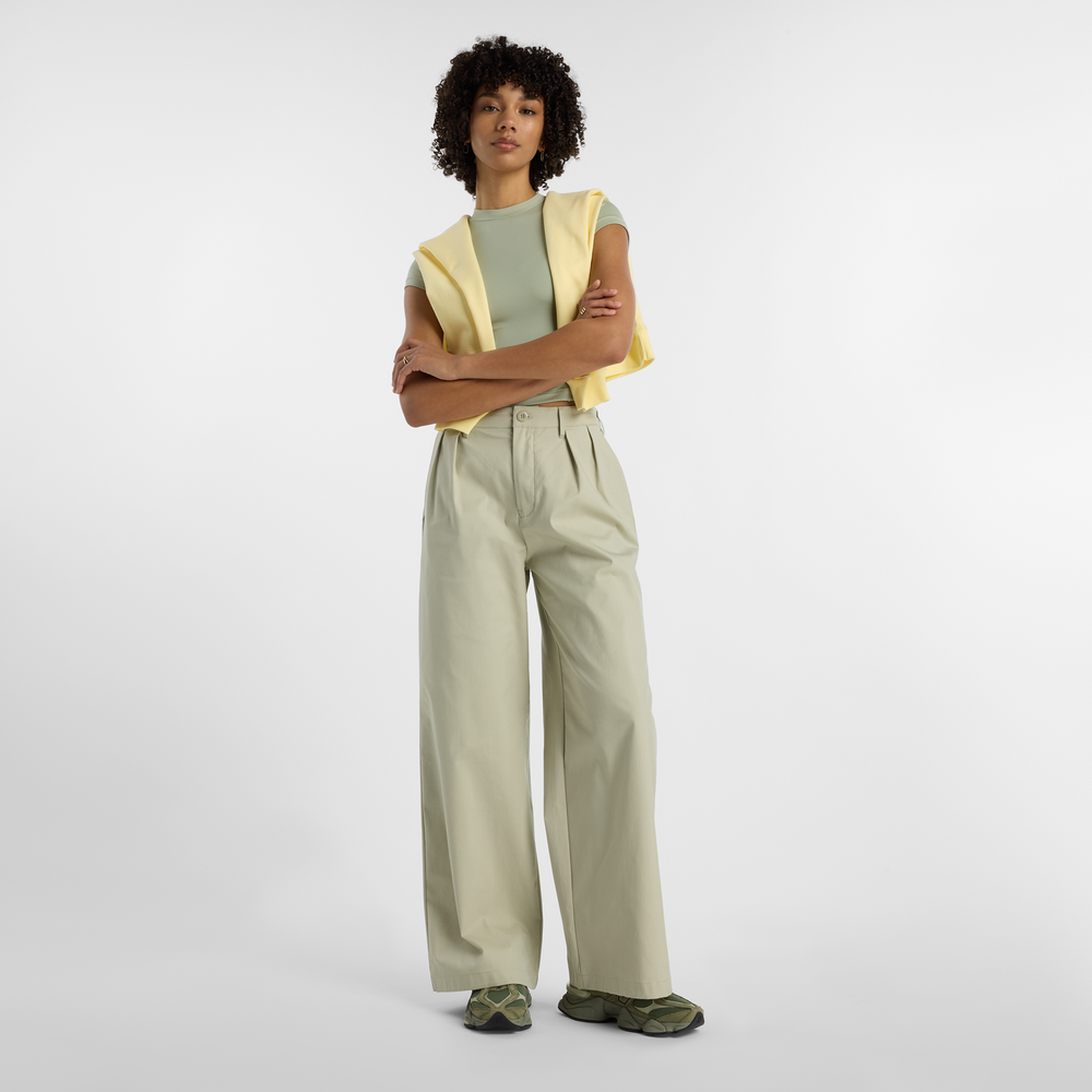 Spodnie damskie New Balance WP51538OVN – beżowe