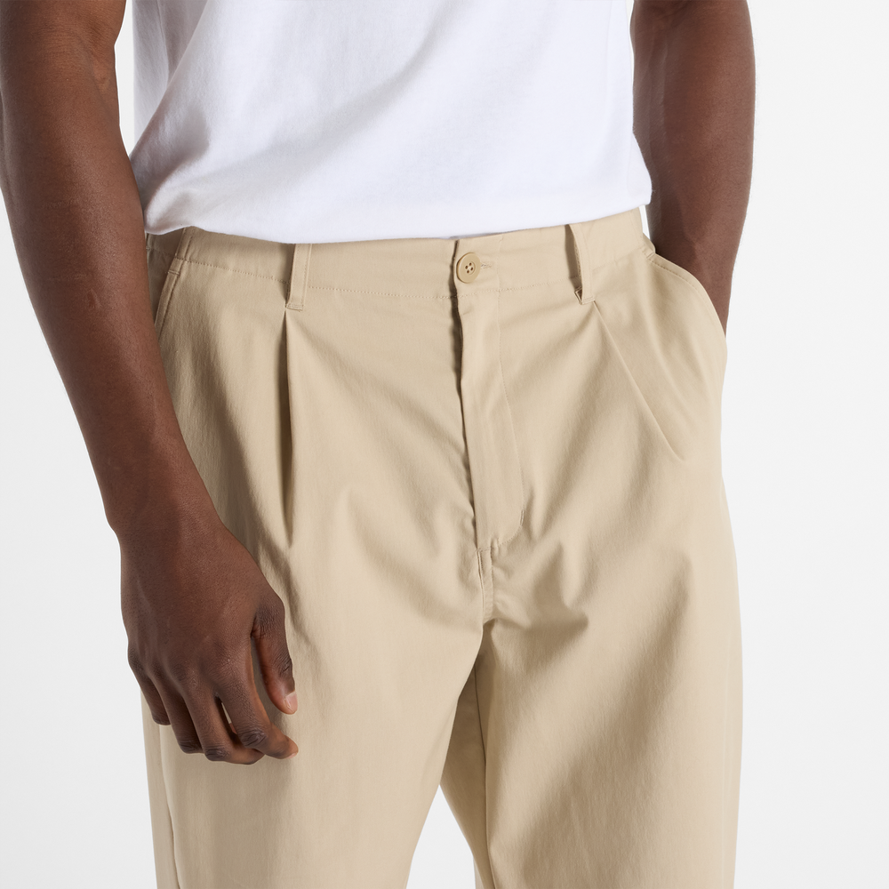 Spodnie męskie New Balance MP51563SOT – beżowe