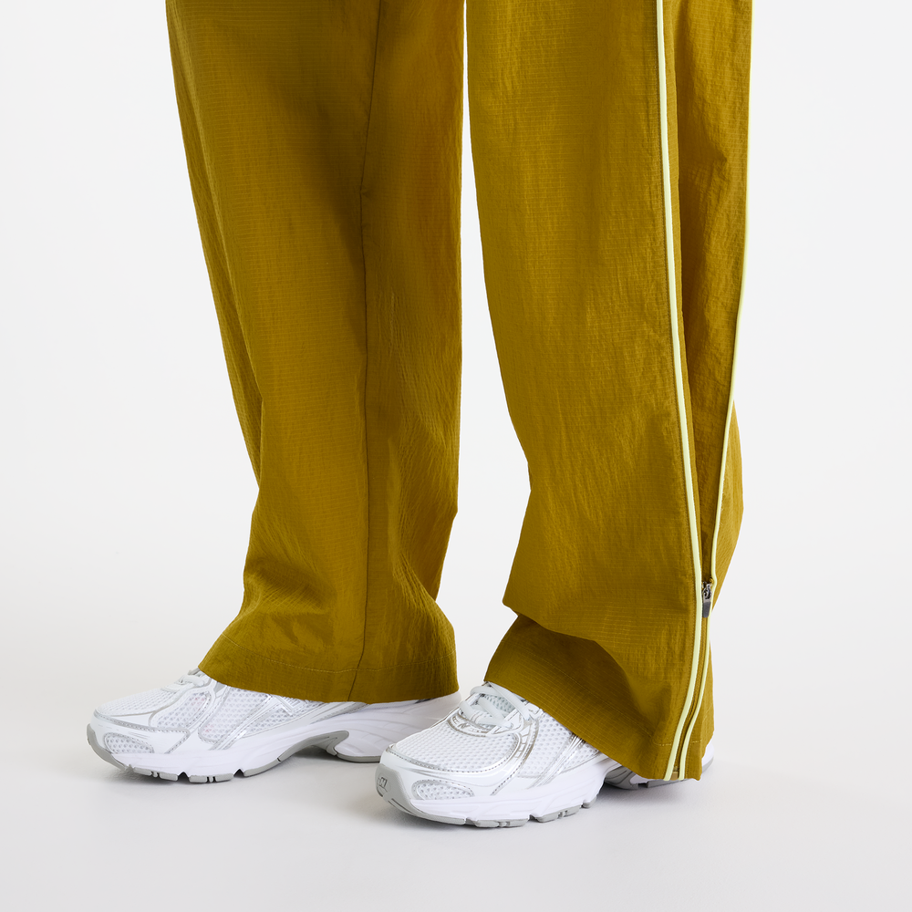 Spodnie damskie New Balance Sport Legacy – żółte