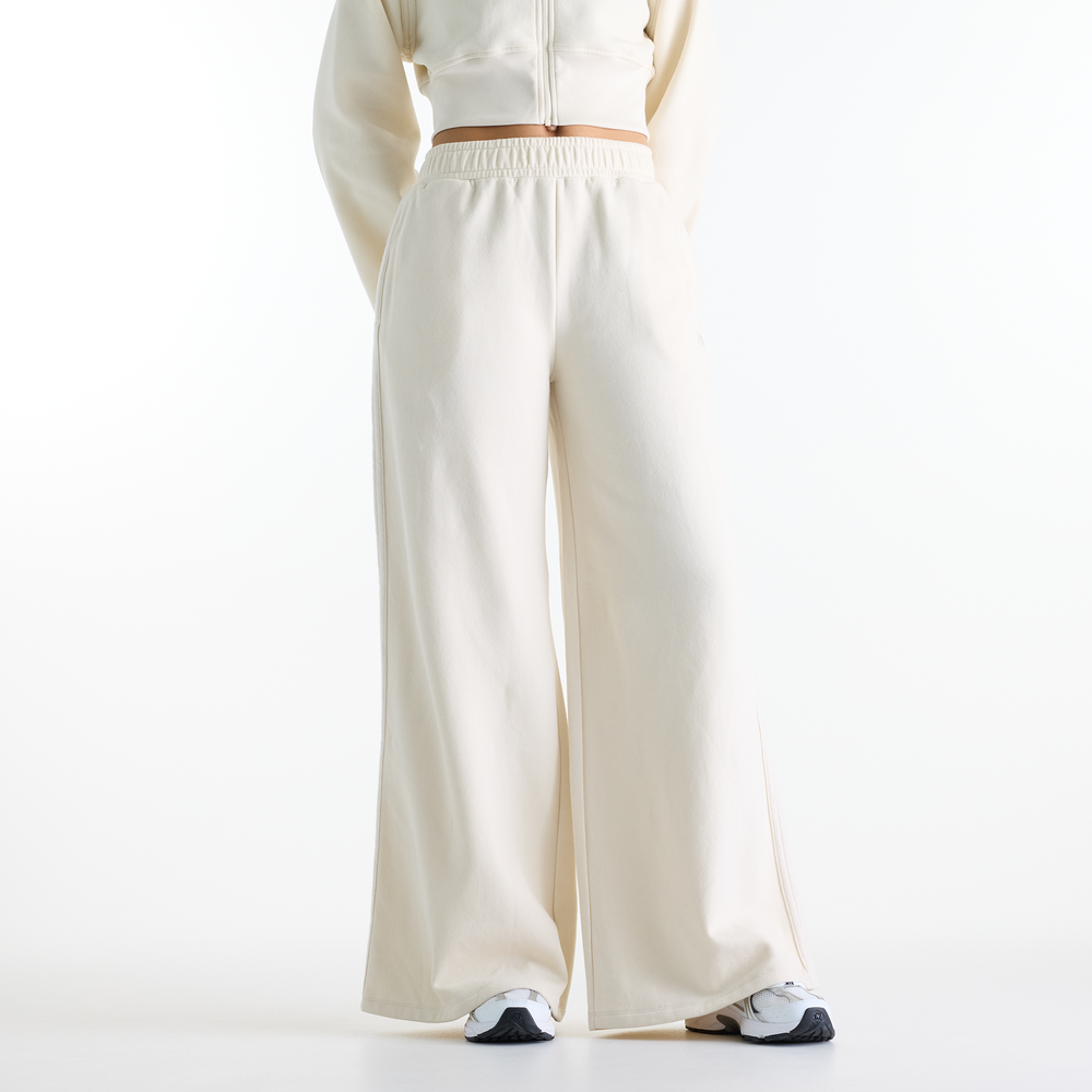 Spodnie damskie New Balance WB6220LWLIN – beżowe