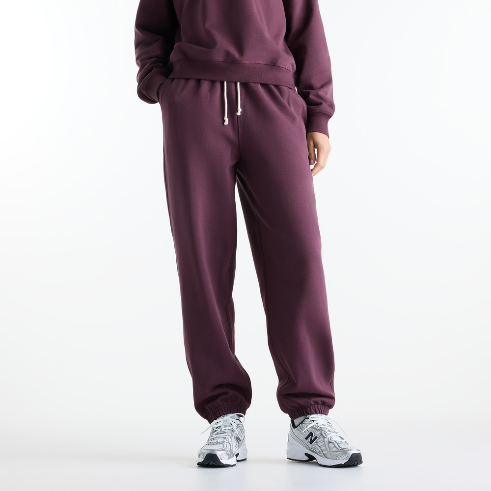 Spodnie damskie New Balance WP41513YLR – fioletowe
