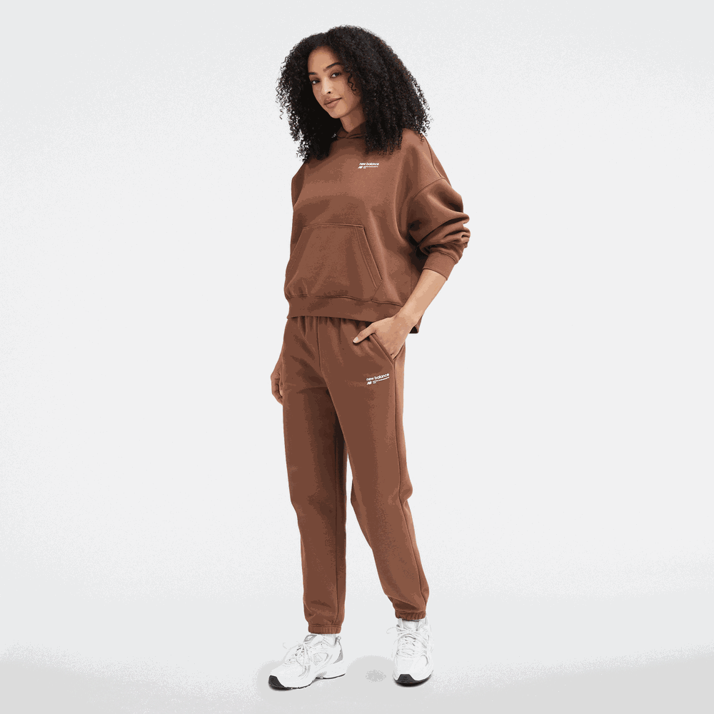 Spodnie damskie New Balance WP33513PNC – brązowe