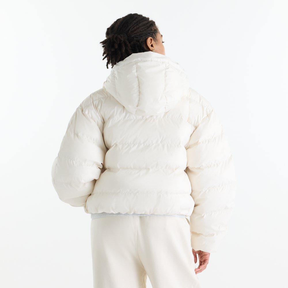 Kurtka damska New Balance Boston Puffer – beżowa