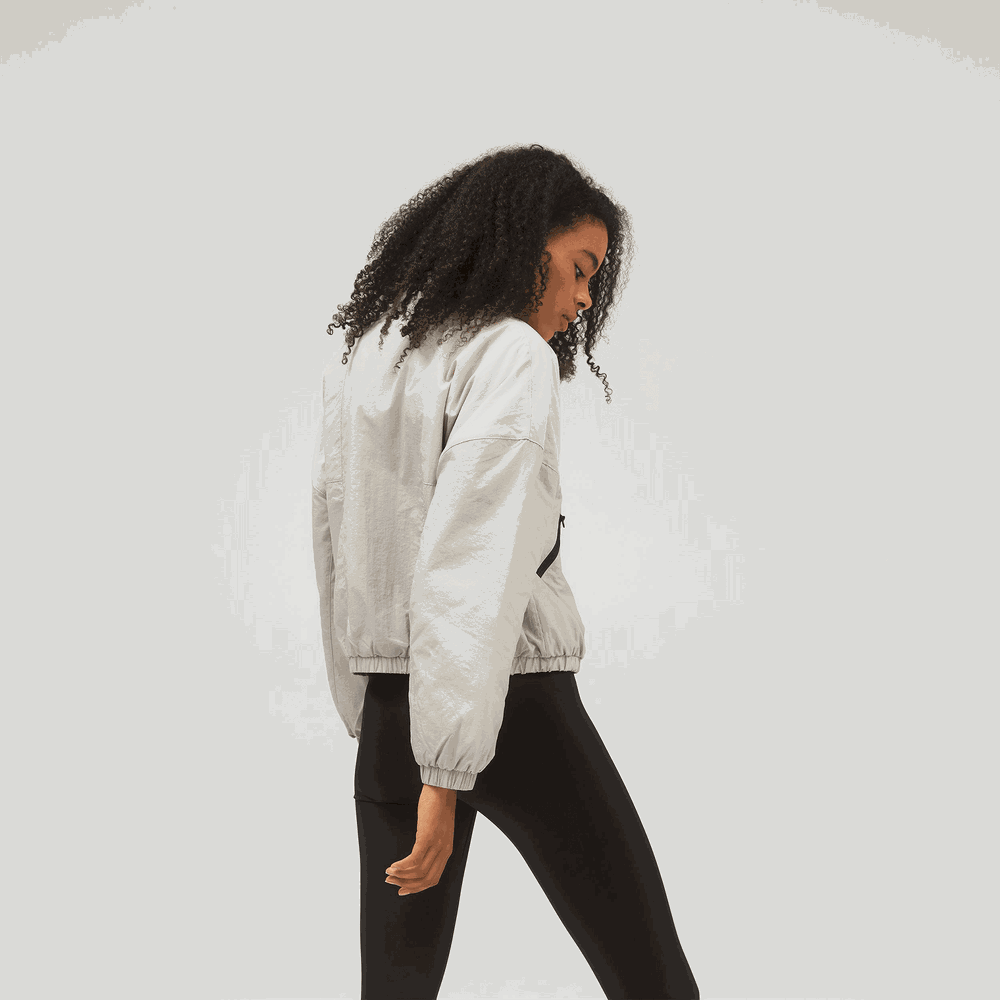 Kurtka New Balance WJ13504TWF – szara