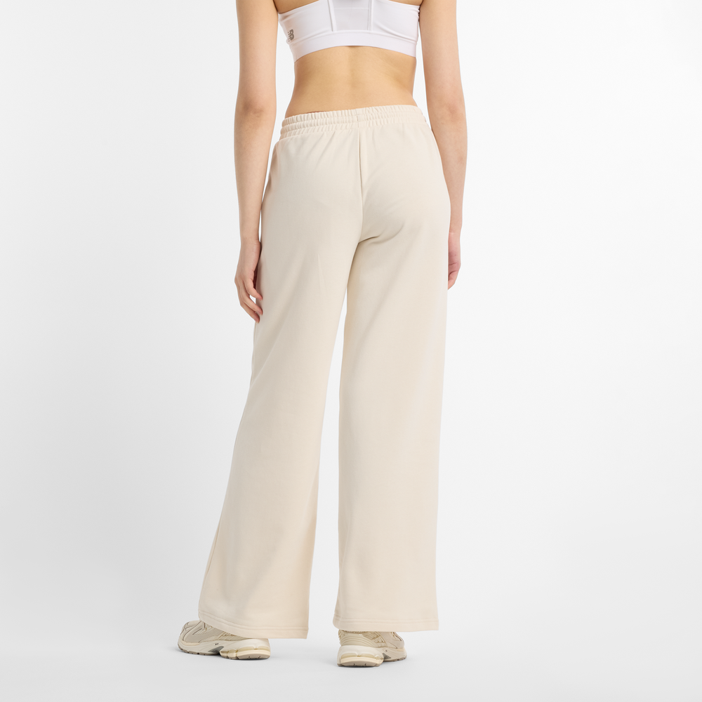 Spodnie damskie New Balance WP51503LIN – beżowe