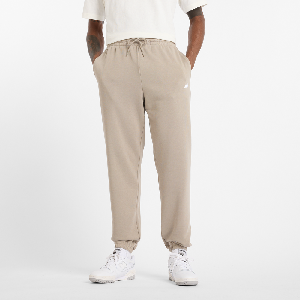 Spodnie męskie New Balance MP41519ADS – beżowe