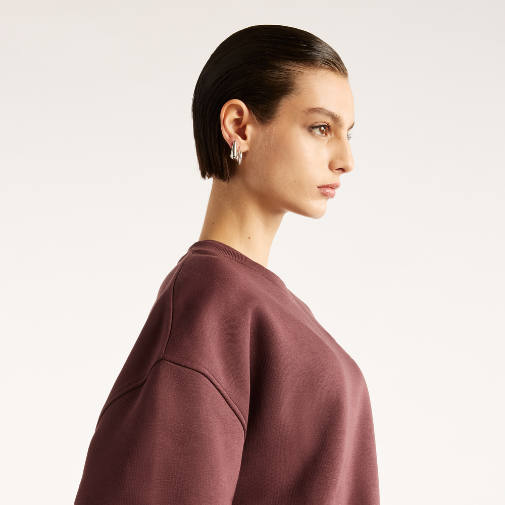 Bluza damska New Balance Trackside – bordowa