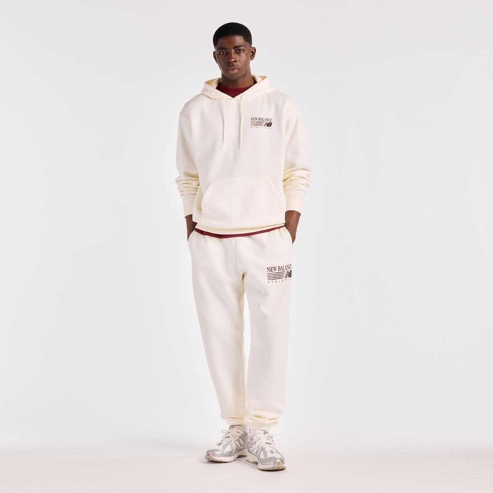 Spodnie męskie New Balance Reimagined Graphic – beżowe