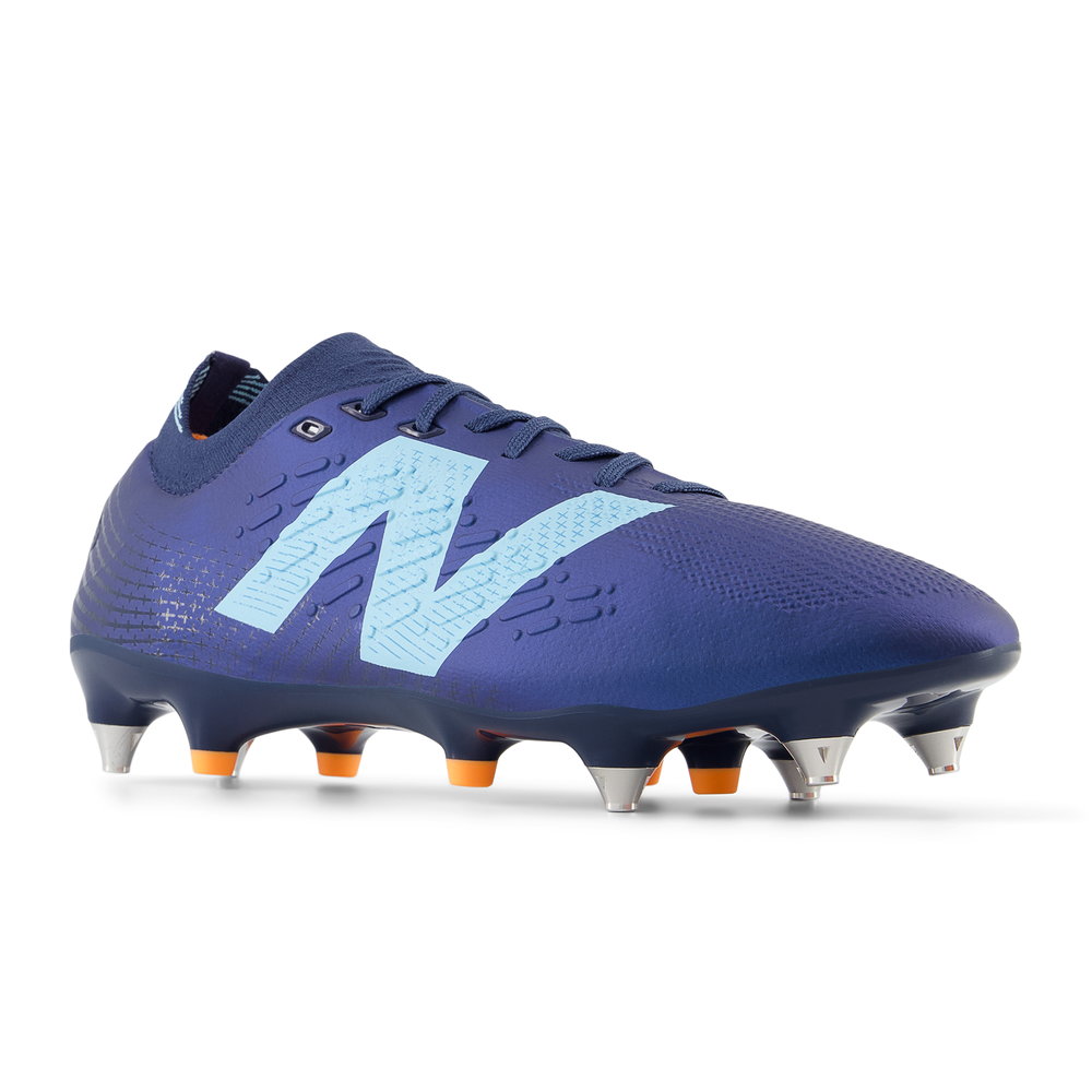 Korki męskie New Balance TEKELA PRO SG V4+ ST1SLN45 – granatowe