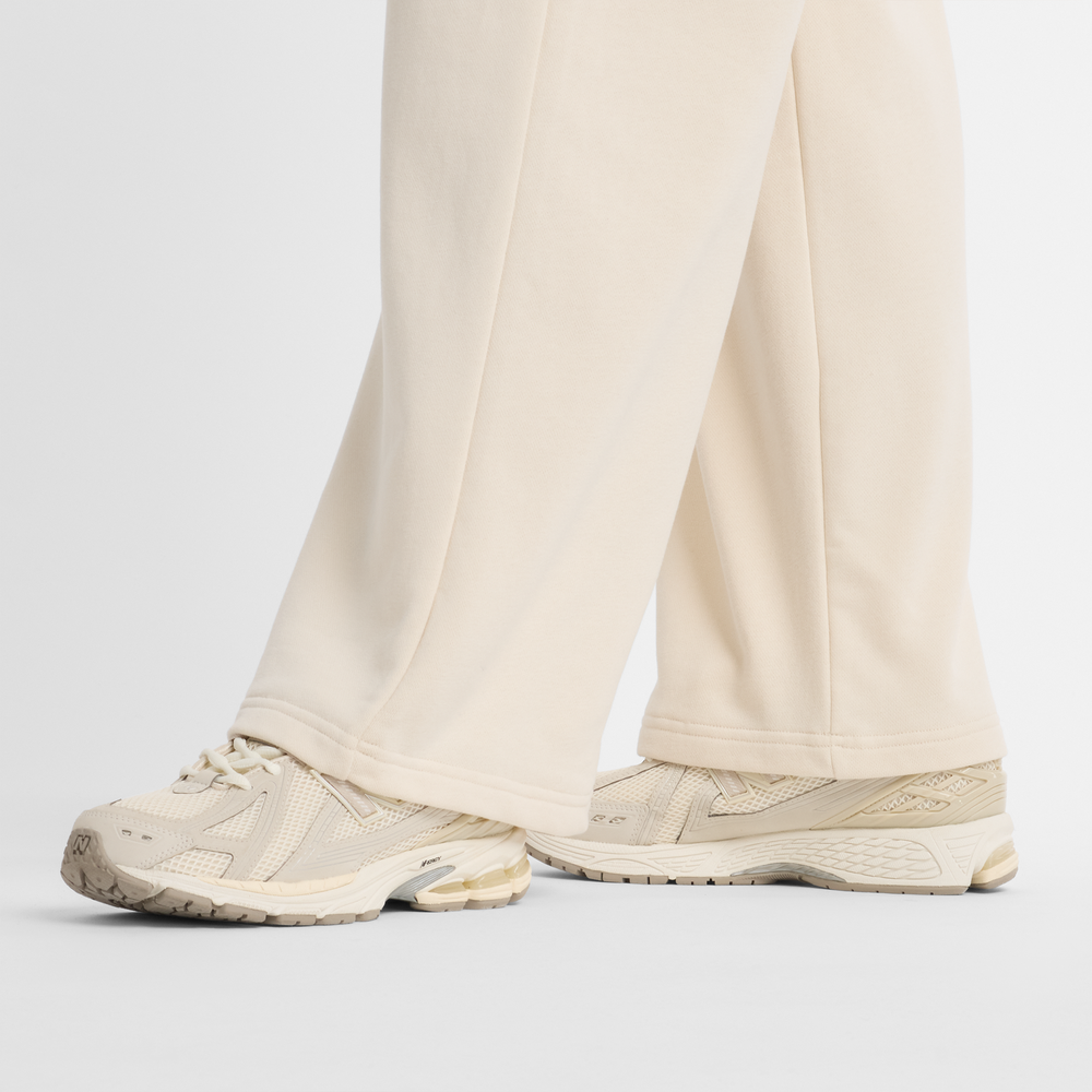 Spodnie damskie New Balance WP51503LIN – beżowe