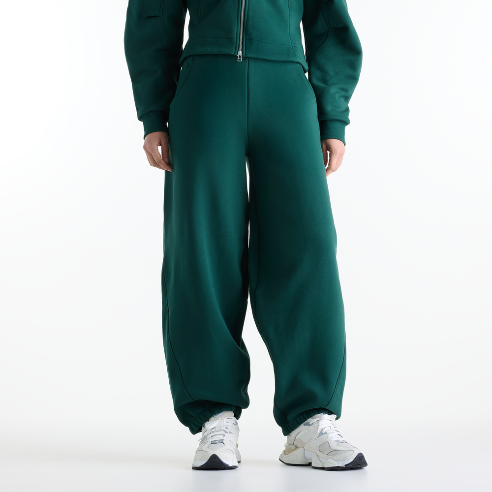 Spodnie damskie New Balance WB62L0NLNOG – zielone
