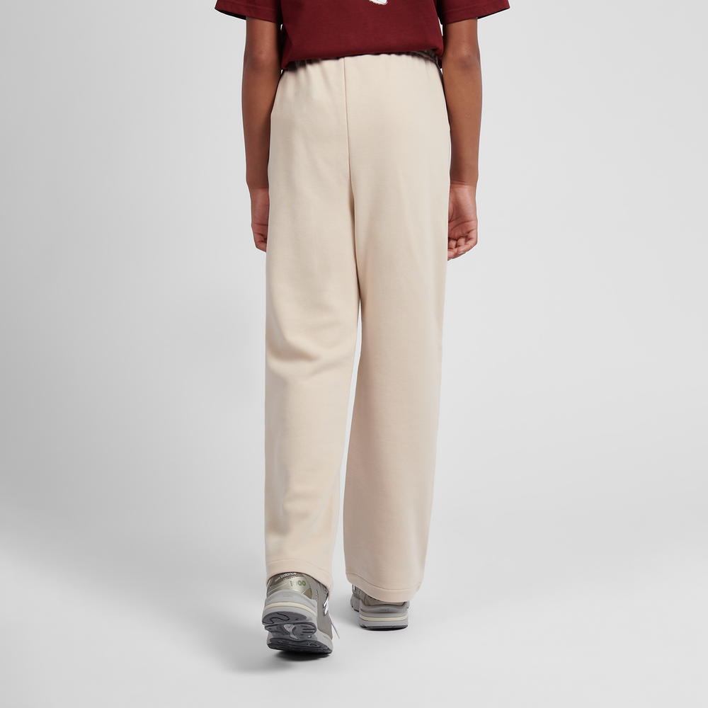 Spodnie dziecięce New Balance LAKG0216BIS – beżowe