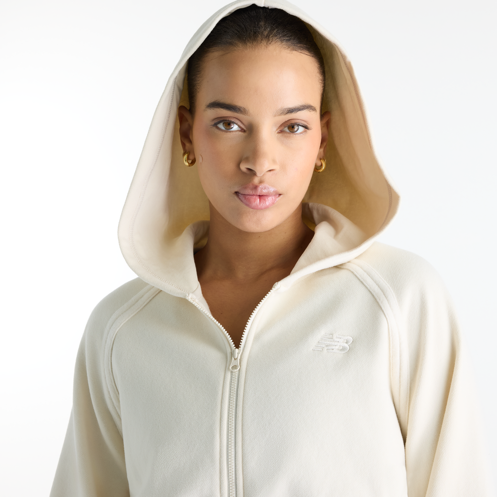 Bluza damska New Balance Brushed Coastal – beżowa