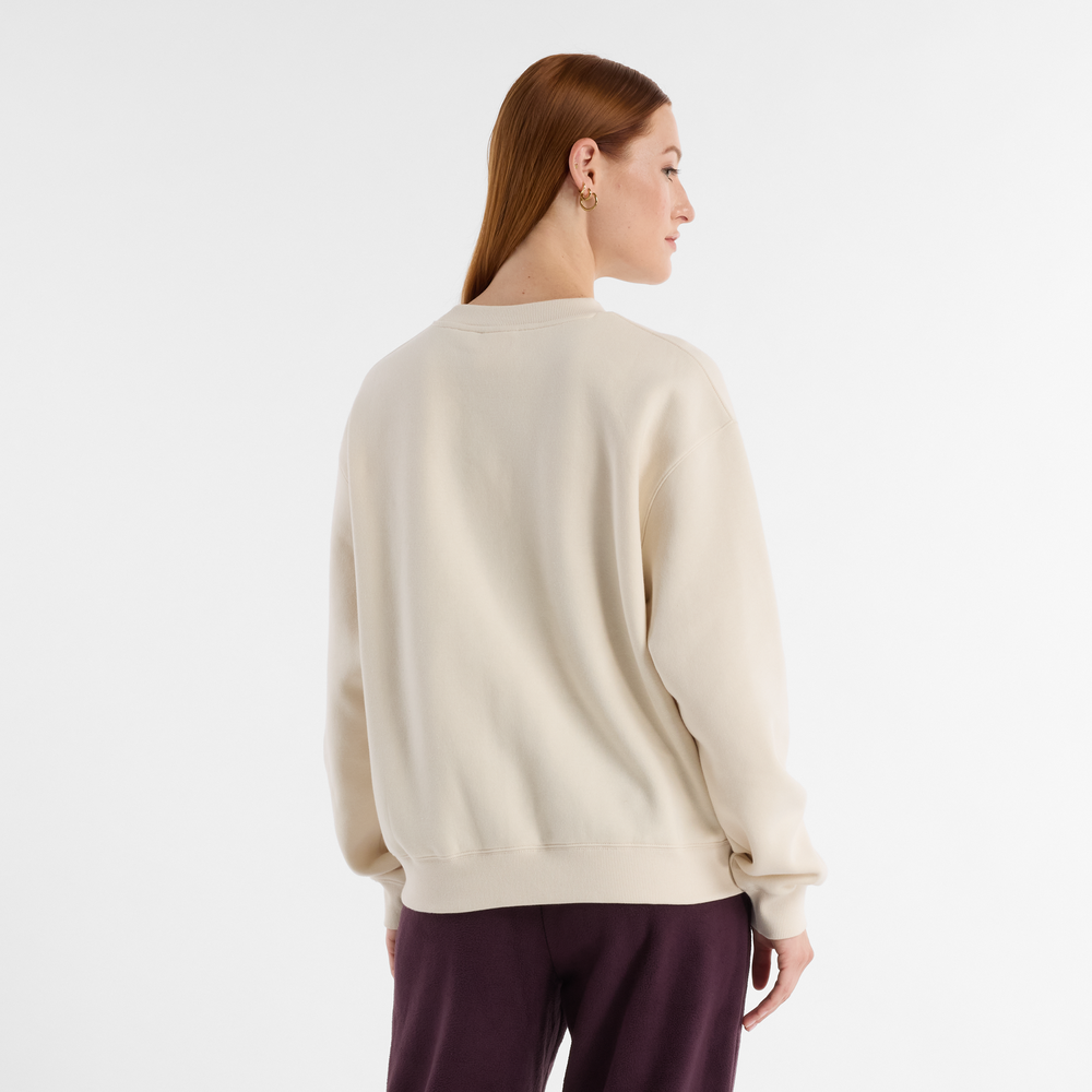 Bluza damska New Balance WT43516LIN – beżowa