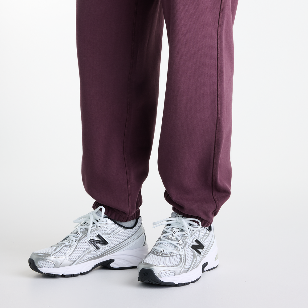 Spodnie damskie New Balance Athletics – fioletowe