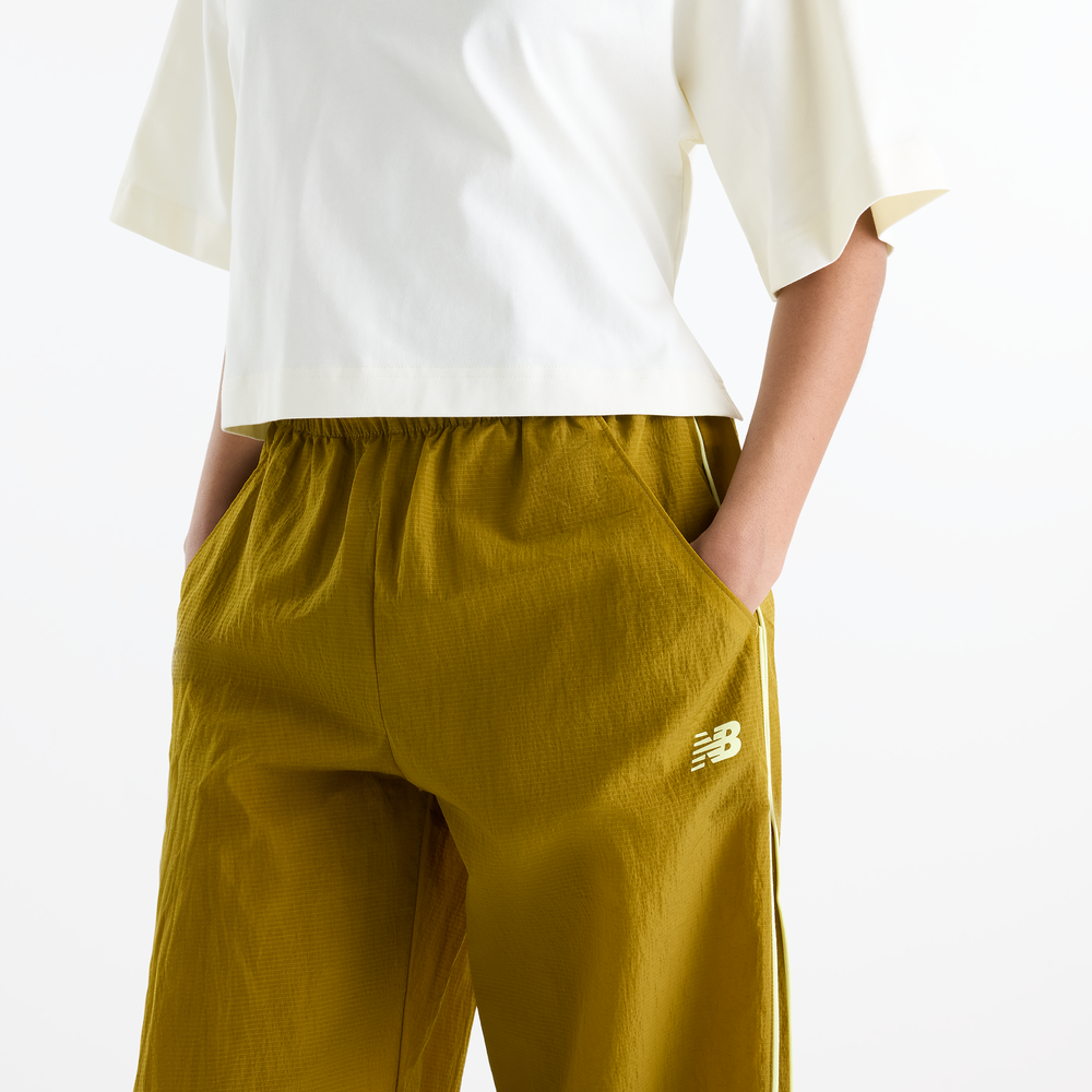 Spodnie damskie New Balance Sport Legacy – żółte