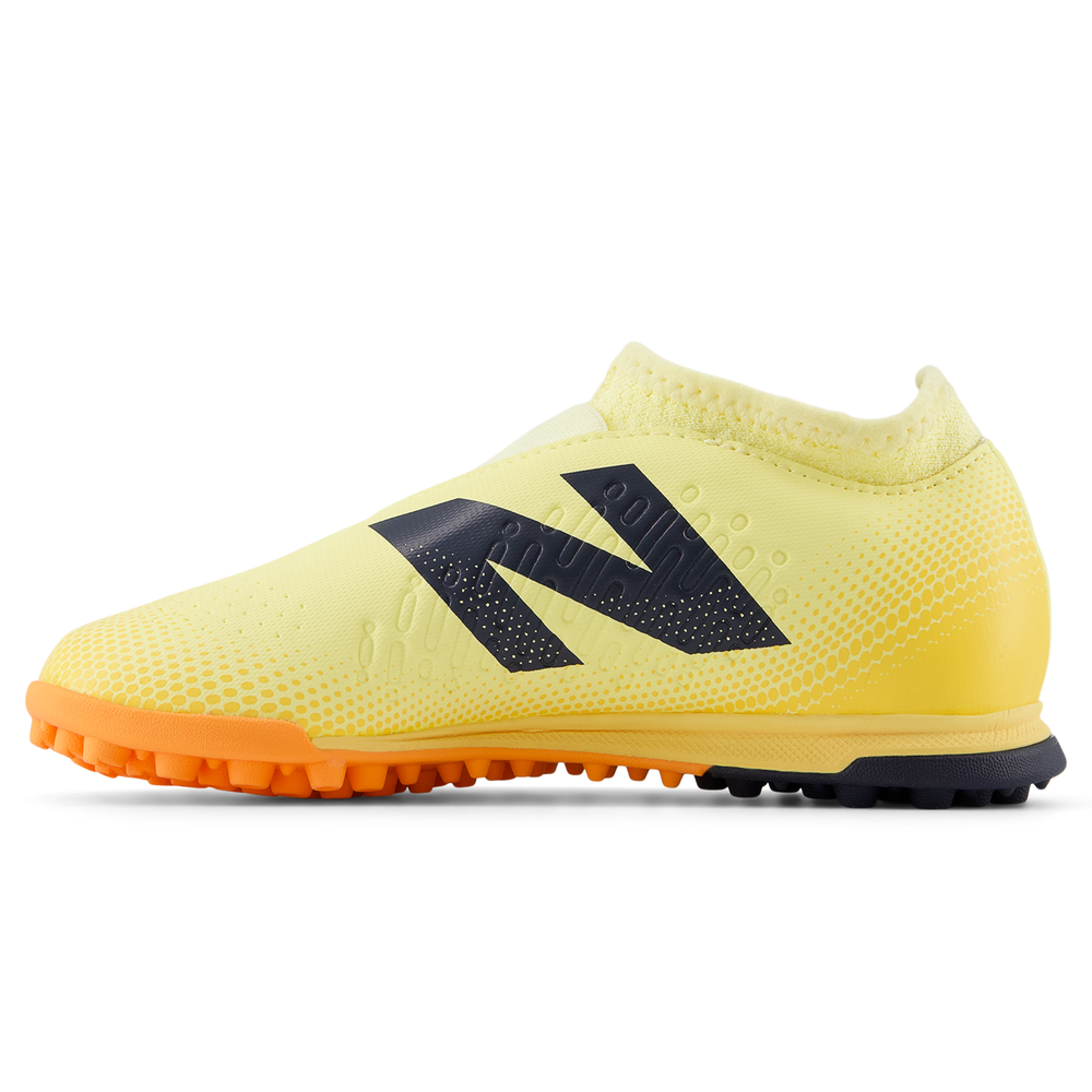 Turfy dziecięce New Balance TEKELA V4+ MAGIQUE JNR FG SJT3TJ45 – żółte