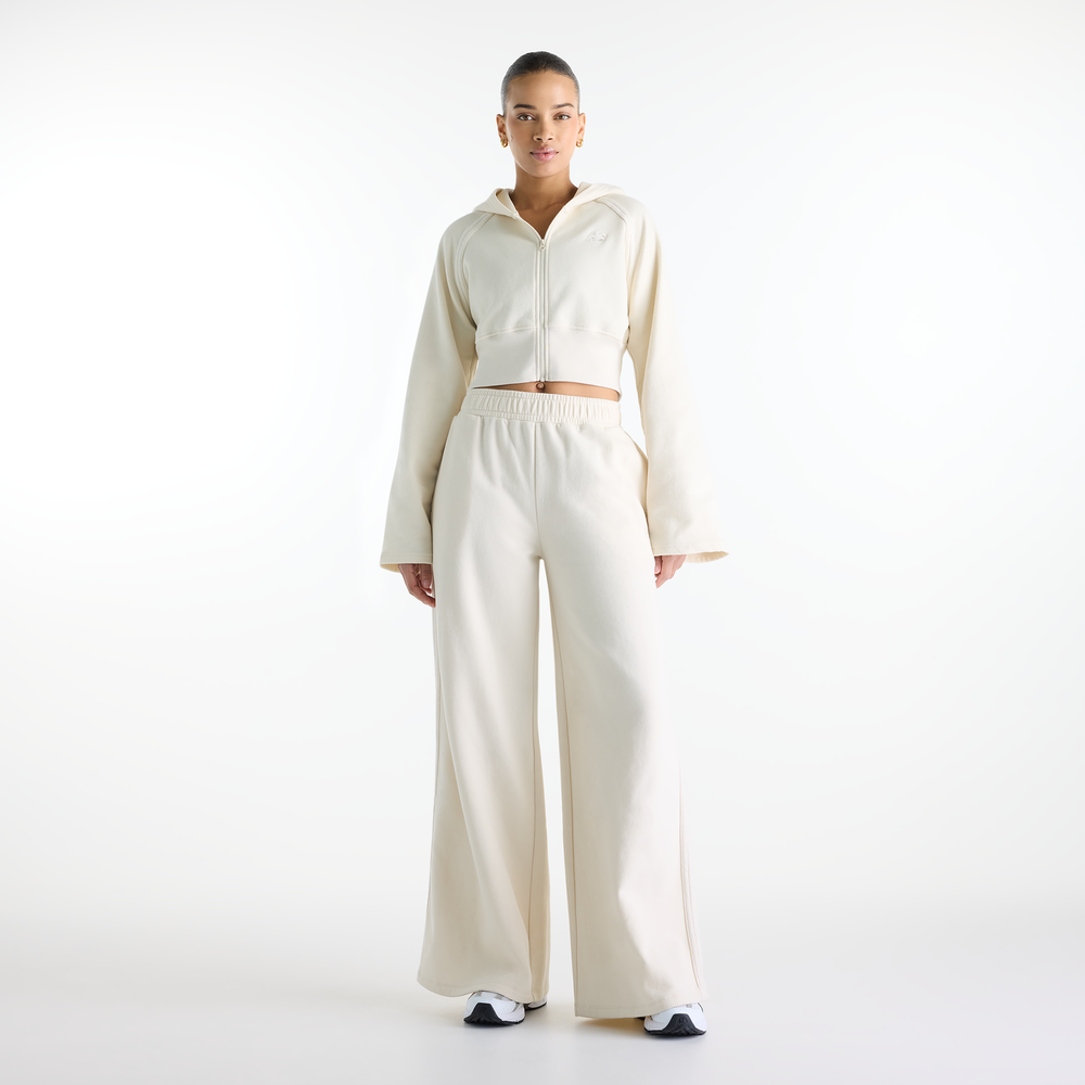 Bluza damska New Balance Brushed Coastal – beżowa
