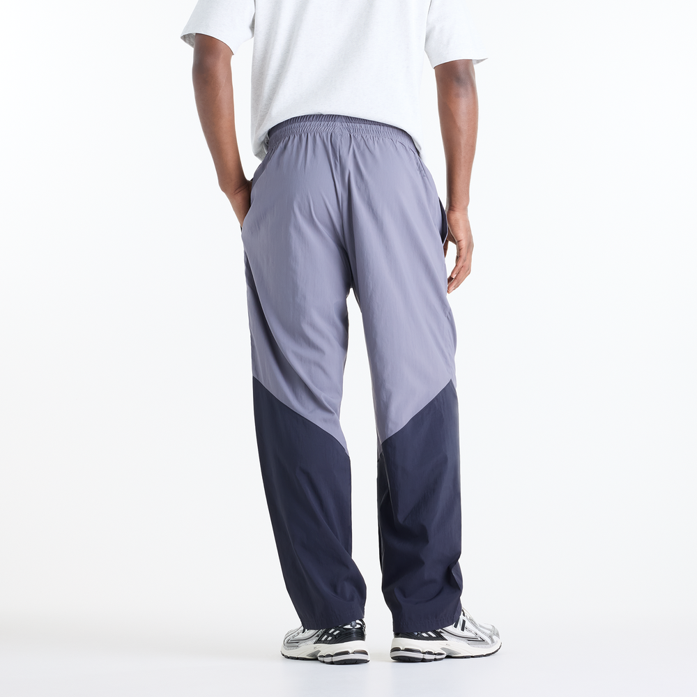 Spodnie męskie New Balance Sport Legacy – fioletowe