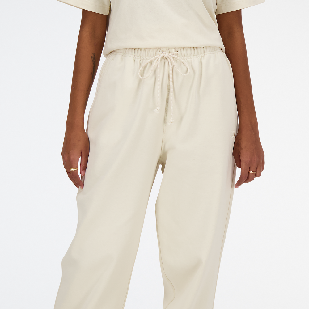 Spodnie damskie New Balance WP41513LIN – beżowe