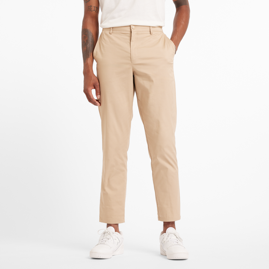 Spodnie męskie New Balance MP43554SOT – beżowe