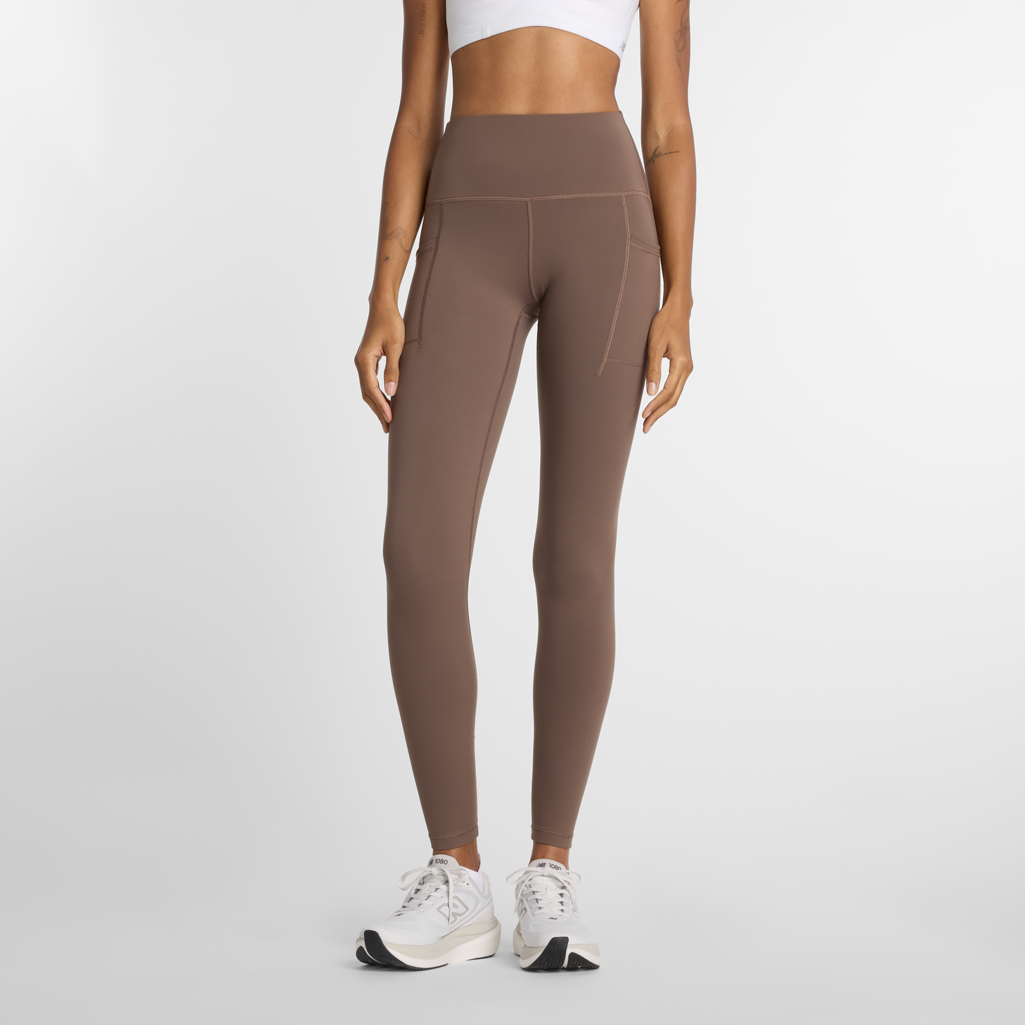 Legginsy damskie do biegania New Balance Sleek WP51275ABP – brązowe