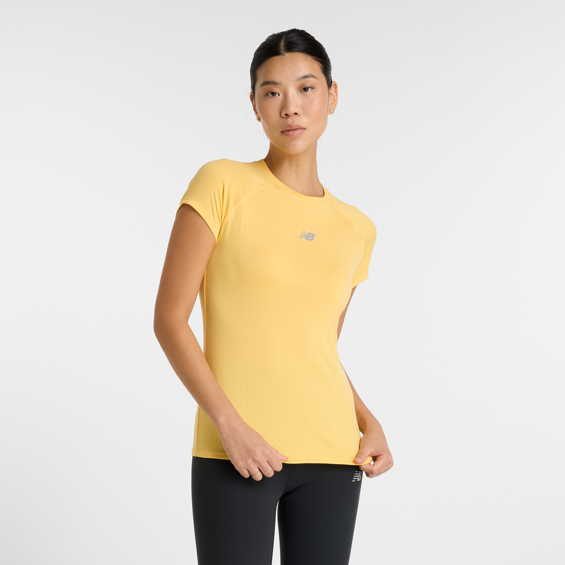 Koszulka damska New Balance WT51223CEE – żółta