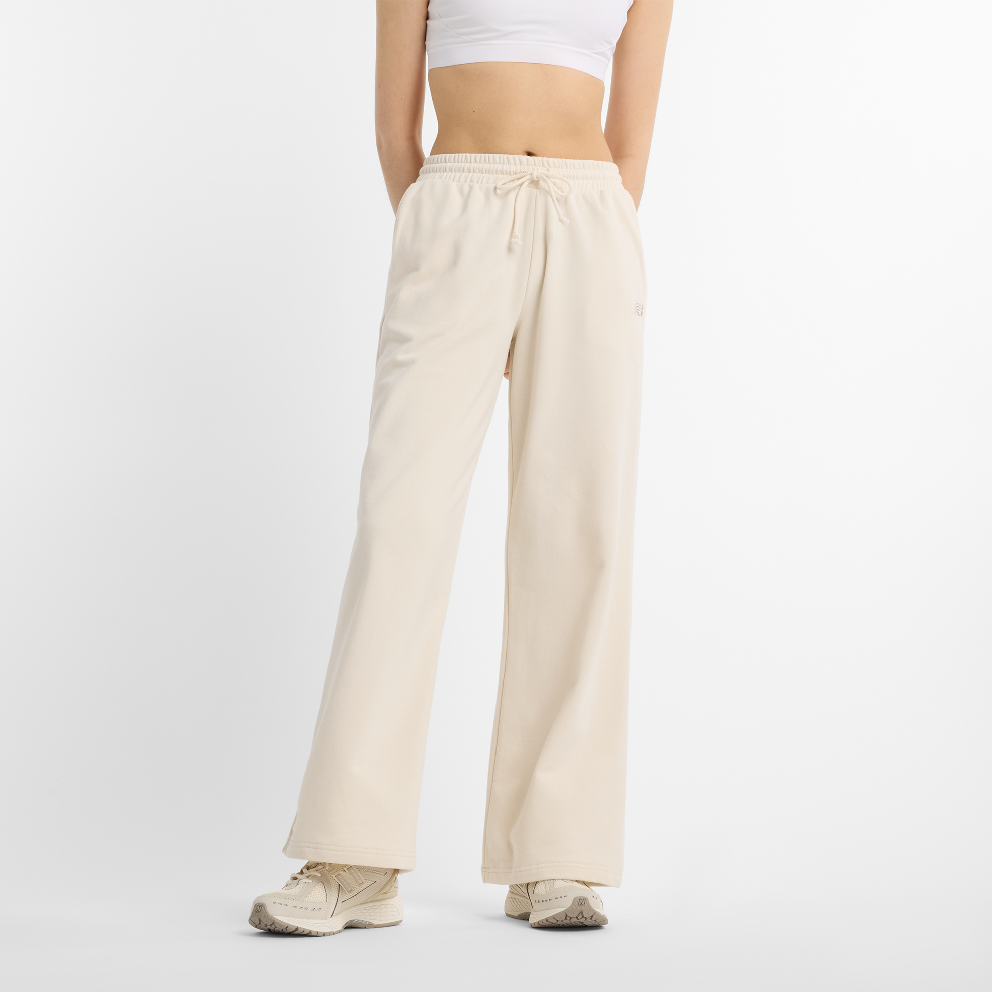 Spodnie damskie New Balance WP51503LIN – beżowe