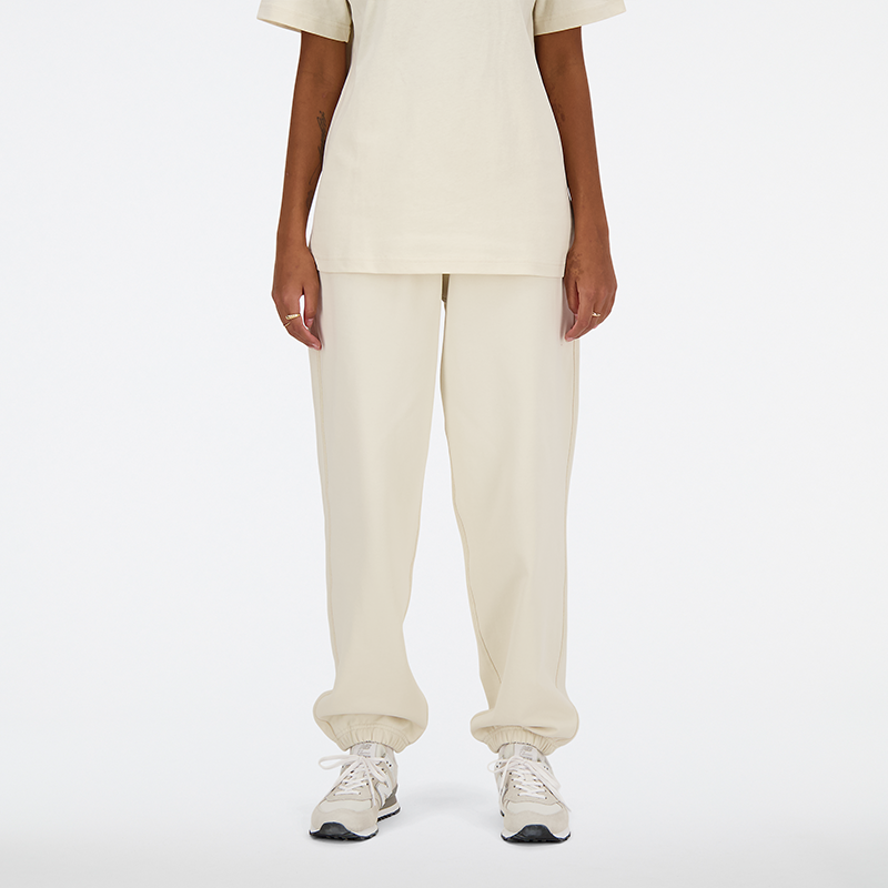 Spodnie damskie New Balance WP41513LIN – beżowe