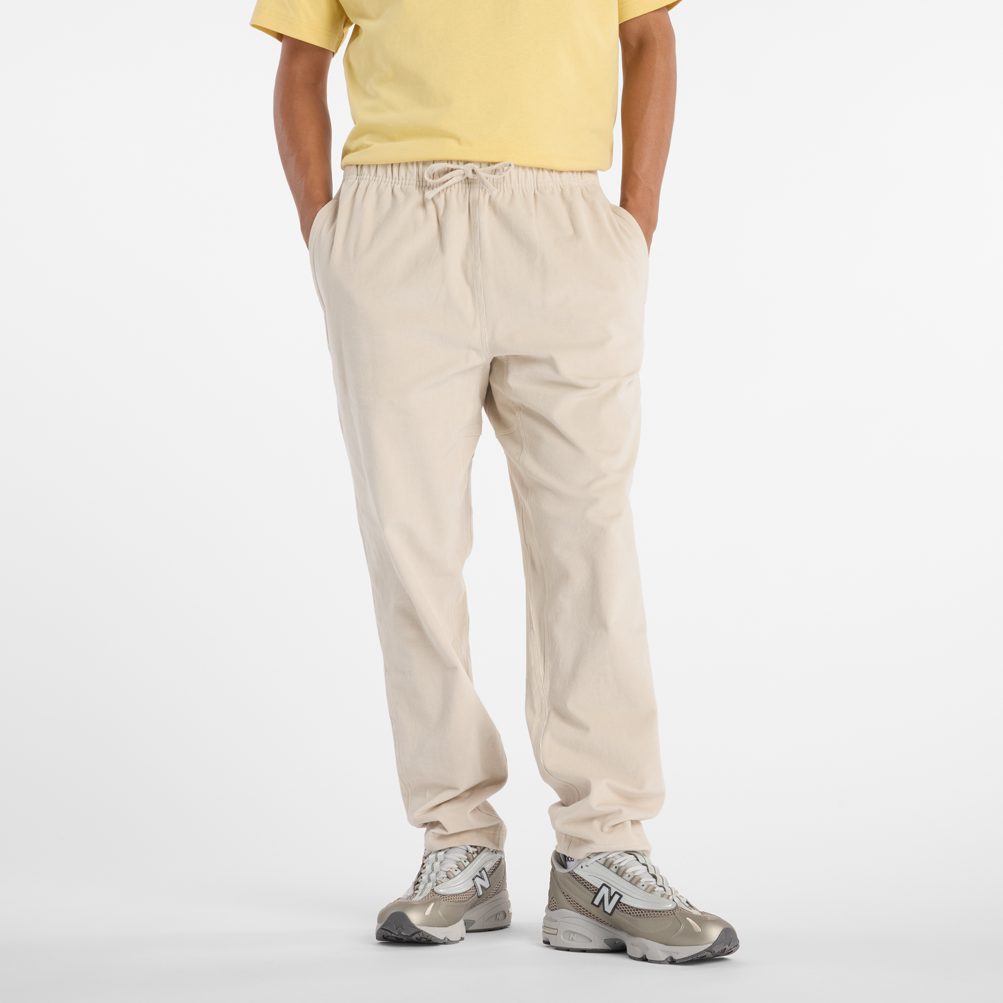 Spodnie męskie New Balance MP53521TWF – beżowe