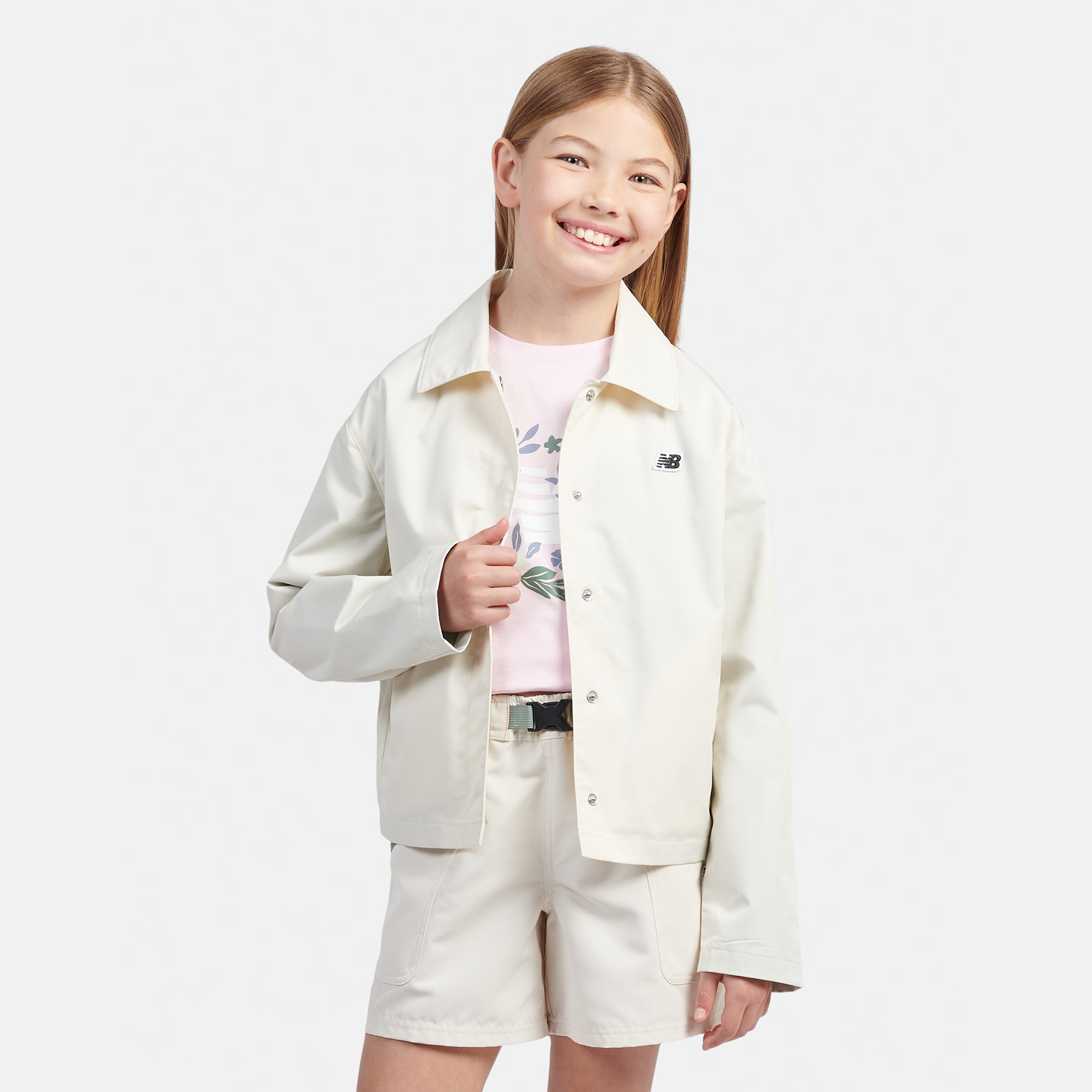 Kurtka dziecięca New Balance LAKG0095LIN – beżowa