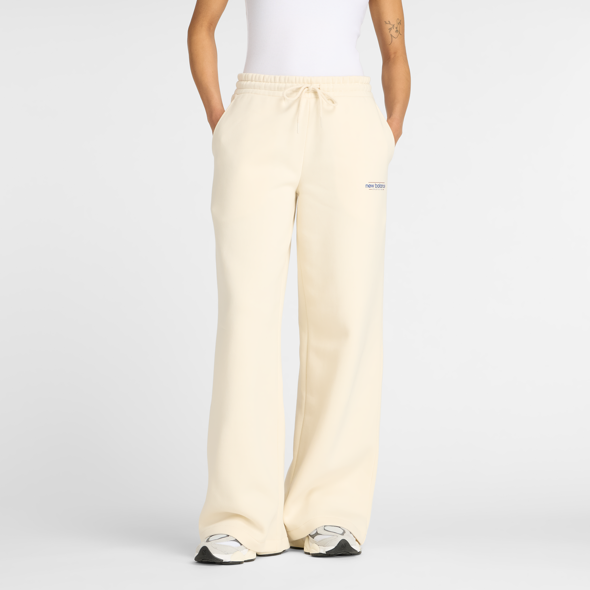 Spodnie damskie New Balance WP53903LIN – beżowe